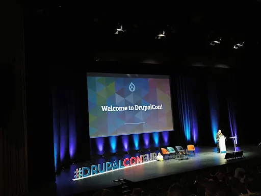 DrupalCon Lille 2023 auditorium welcome to drupalcon slide